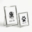 Elegant silver keepsake frames with filigree corners. Perfectly frames a black ink dog nose print and a matching paw print. These delicate metal frames add a touch of vintage charm to any home decor while honoring a beloved furry friend.