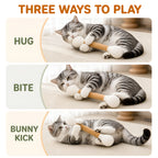Cat hugging, biting and bunny-kicking the oversized felt cotton swab toy