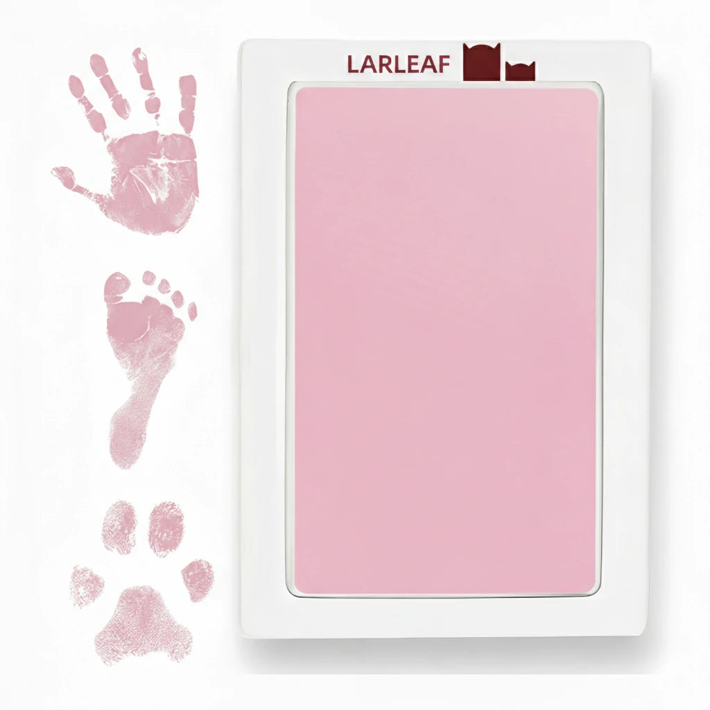 LARLEAF pink mess free ink pad and three pink ink impressions: a human handprint, a baby footprint, and a pet paw print.  Designed for newborns and pets. Capture Paw print and nose print. Main image