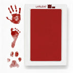 LARLEAF red mess free ink pad and three red ink impressions: a human handprint, a baby footprint, and a pet paw print.  Designed for newborns and pets. Capture Paw print and nose print.
