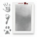 LARLEAF Silver mess free ink pad and three black ink impressions: a human handprint, a baby footprint, and a pet paw print.  Designed for newborns and pets. Capture Paw print and nose print.