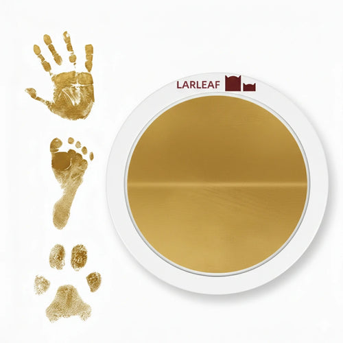 LARLEAF gold round mess free ink pad featuring the brand logo. Shown next to sample prints of a hand, baby foot, and dog paw print. Circular mess-free print kit ideal for DIY Pet Memorials Goods