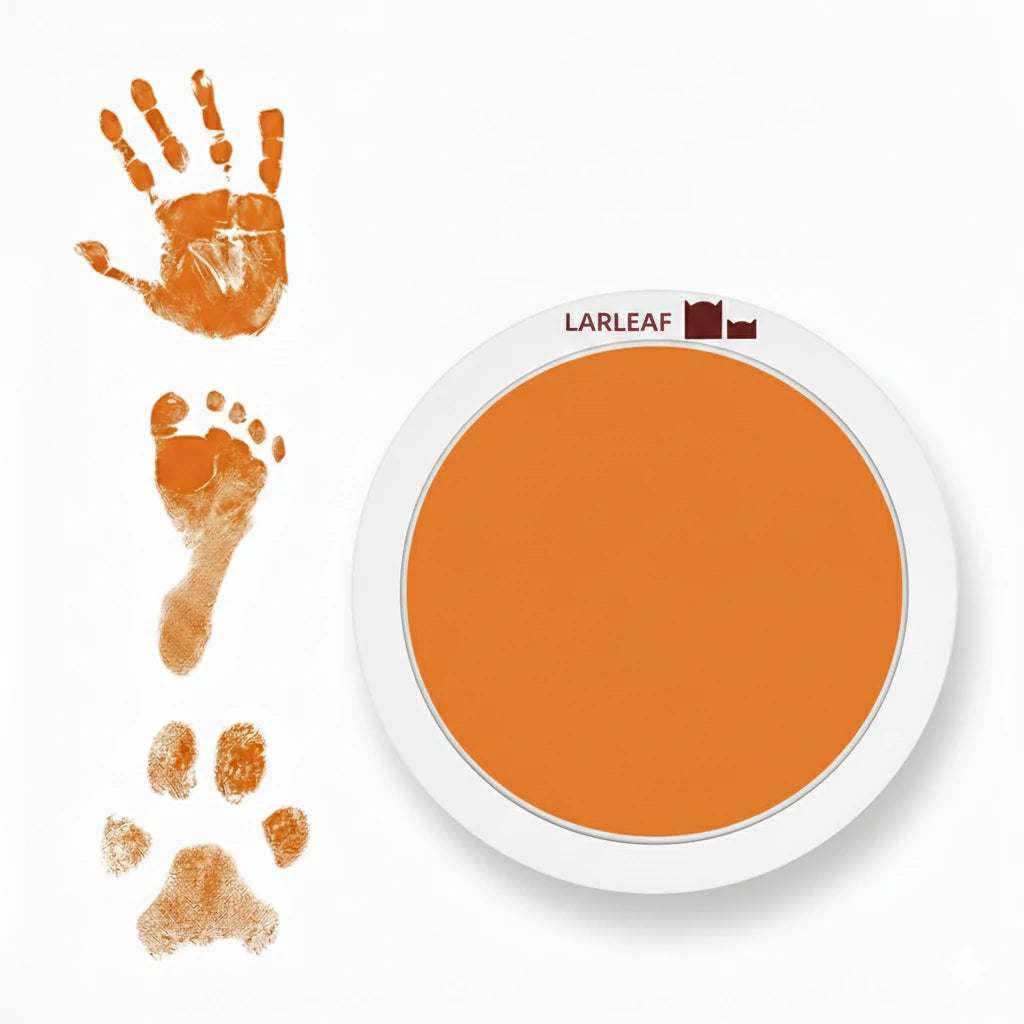 LARLEAF orange round mess free ink pad featuring the brand logo. Shown next to sample prints of a hand, baby foot, and dog paw print. Circular mess-free print kit ideal for DIY Pet Memorials Goods