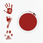 LARLEAF red round mess free ink pad featuring the brand logo. Shown next to sample prints of a hand, baby foot, and dog paw print. Circular mess-free print kit ideal for DIY Pet Memorials Goods