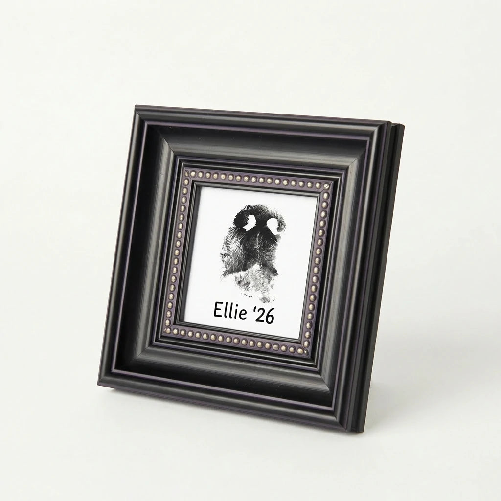 Sympathy gift for grieving dog owners: A custom nose print memorial in an ornate black frame. Features a distinct beaded border and personalized details. This touching bereavement keepsake preserves a pet's actual nose impression forever in style.
