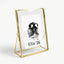A touching pet memorial keepsake featuring a custom dog nose print stamped in black ink on white paper, floating inside a luxury gold metal glass frame. The personalized artwork includes the pet's name and year. Designed as a bereavement gift for loss of a dog, this standing photo frame elegantly showcases the unique details of a pet's nose, offering a lasting tribute and comfort for pet parents dealing with the loss of their best friend