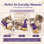 Kitten cuddling, resting beside, and playing with the Larleaf catnip wobble toy