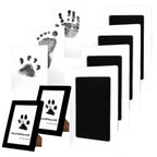 Larleaf mess-free ink pad set including ink pads and black photo frames. Designed for newborns and pets, this clean-touch kit allows for capturing paw prints or footprints without ink ever touching the skin.