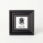 Ornate black square picture frame with detailed beaded trim. Inside is a custom dog nose print ink impression and text 'Ellie '26'. This unique pet memorial keepsake is a personalized gift for dog lovers. A decorative frame to remember a beloved pet.