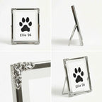 4-in-1 detail shot of a decorative silver picture frame. Shows the front, side profile, and a close-up of the embossed floral corners. Features a minimalist wire easel stand. Perfect for displaying a beloved pet's paw print in a vintage style.